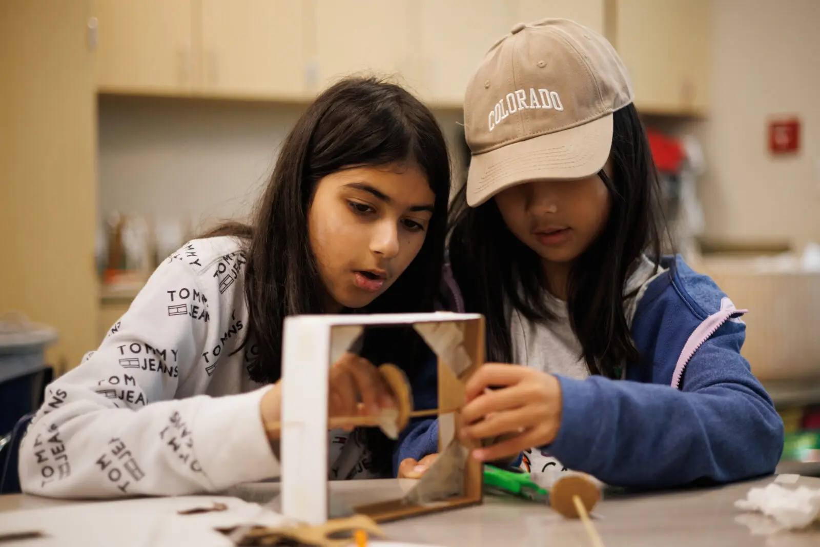 Two campers building a model together at a RAFT STEAM camp